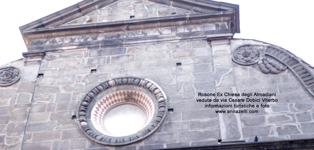rosone alla facciata ex chiesa degli almadiani lato via cesare dobici viterbo centro info e foto
