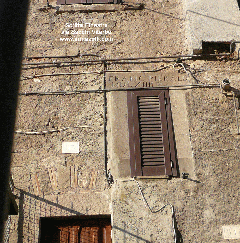 scritta finestra palazzo via sacchi viterbo info foto anna zelli
