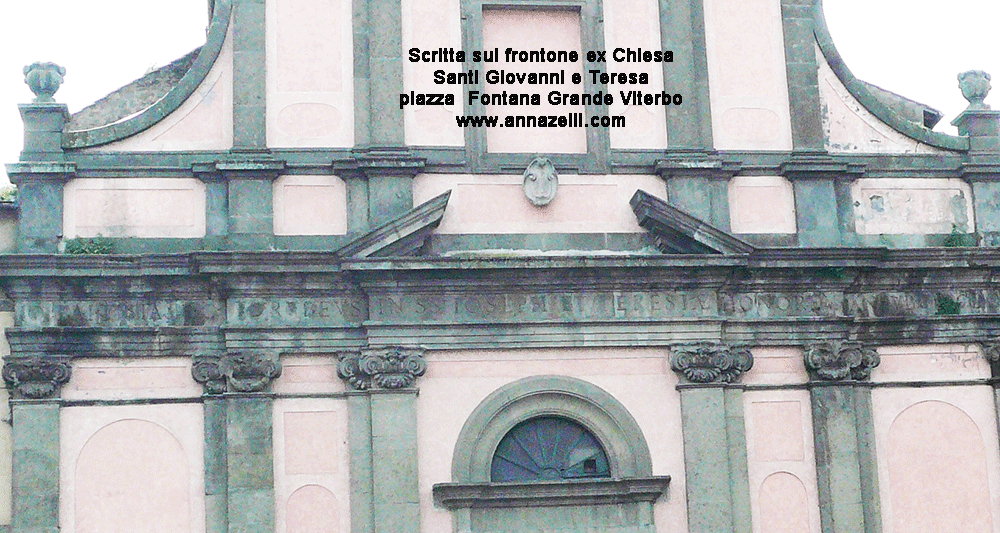 scritta sul frontone ex chiesa santi teresa e giovanni piazza fontana grande viterbo